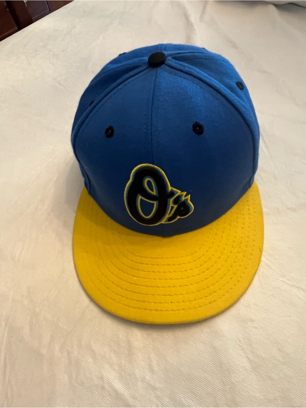 New Era Oshawa Baltimore Orioles Blue and Yellow O's Baseball Cap